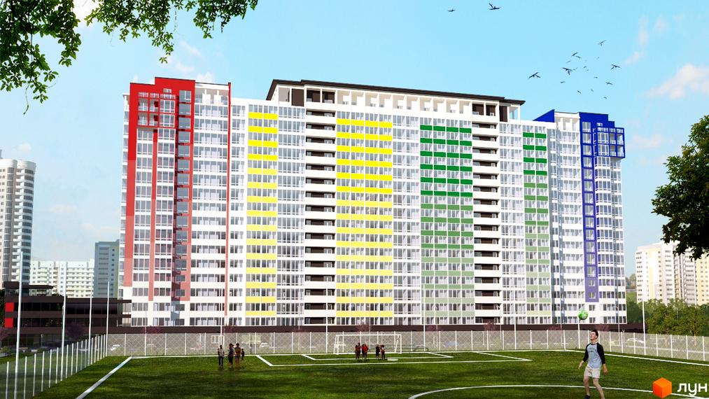Багатоповерховий будинок ЖК Акварель-2 з кольоровими секціями. На території комплексу є футбольне поле.
