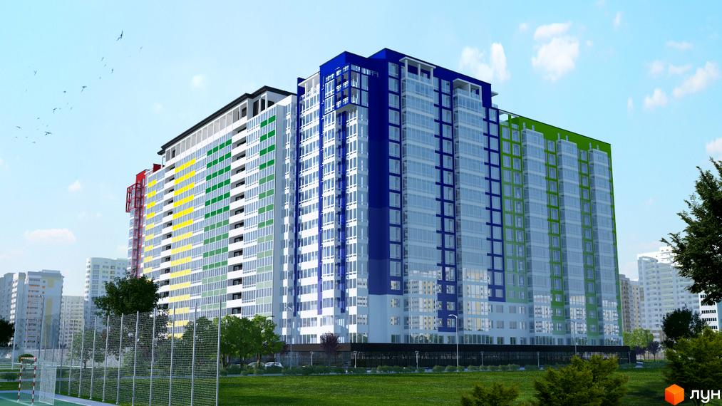 Багатоповерховий будинок житлового комплексу Акварель-2 з кольоровими секціями. Навколо будинку зелена трава та дерева, видно інші будівлі.