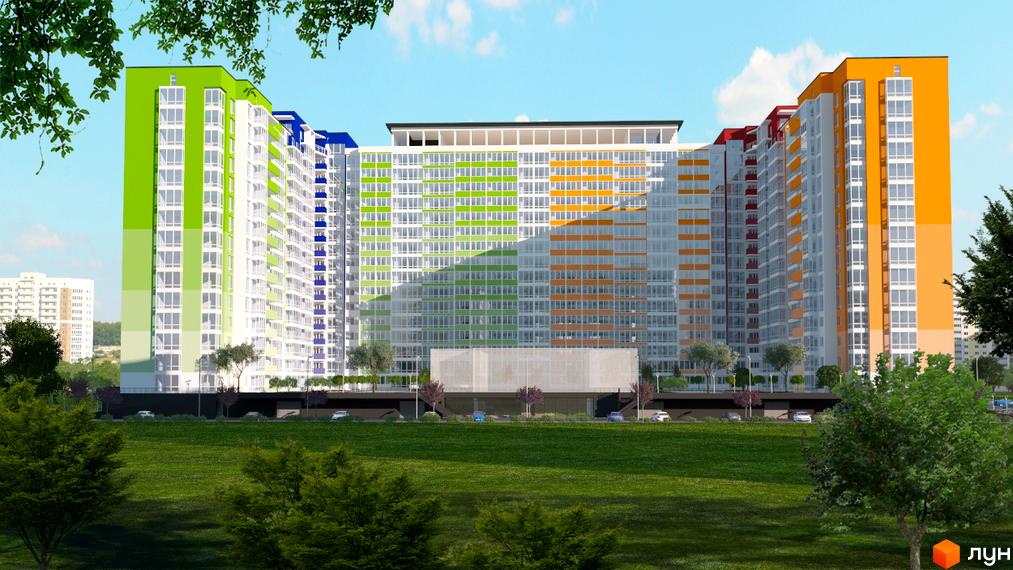 Житловий комплекс Акварель-2. Високоповерховий будинок з різнокольоровими фасадами, розташований на зеленій території з деревами та газоном.