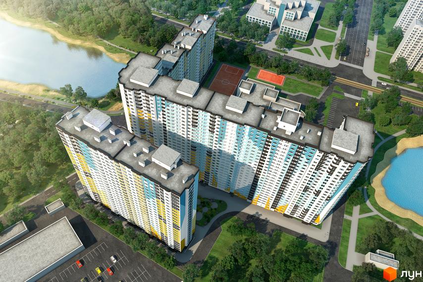 Житловий комплекс НебоSky з висоти, з яскравими фасадами та прибудинковою територією з зеленими насадженнями.