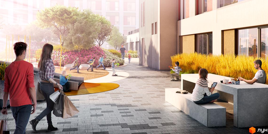 Житловий комплекс San Francisco Creative House з прибудинковою територією, де діти граються, а дорослі відпочивають на лавочці біля будівель.