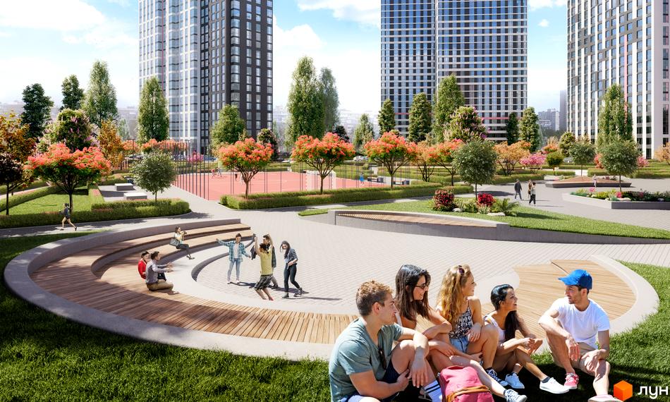 Житловий комплекс Варшавський Плюс: високі будинки та зелена прибудинкова територія з місцями для відпочинку та спортивними майданчиками.