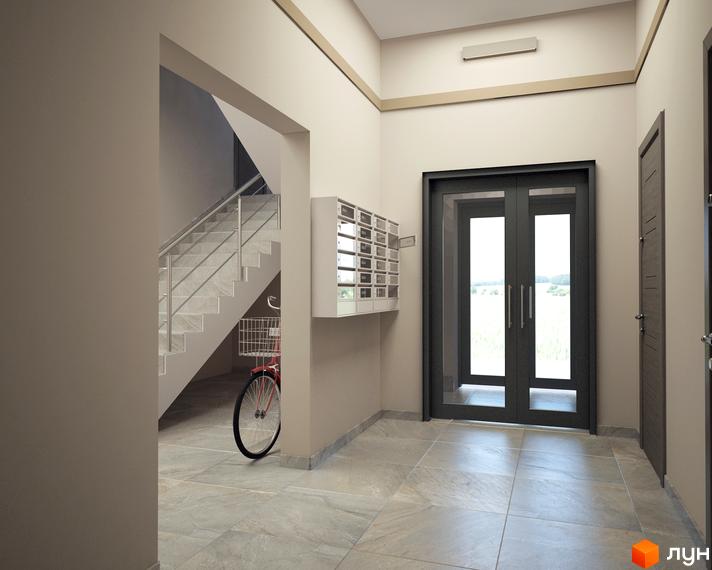 Інтер'єр холу в ЖК Цитадель-2. Просторий хол з дверима, поштовими скриньками та сходами. Поряд з дверима стоїть велосипед.