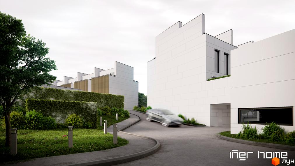 Фасади житлового комплексу Iner Home з білих панелей та дерев'яних вставок. Територія з зеленими насадженнями, доріжками та стінами, покритими плющем.