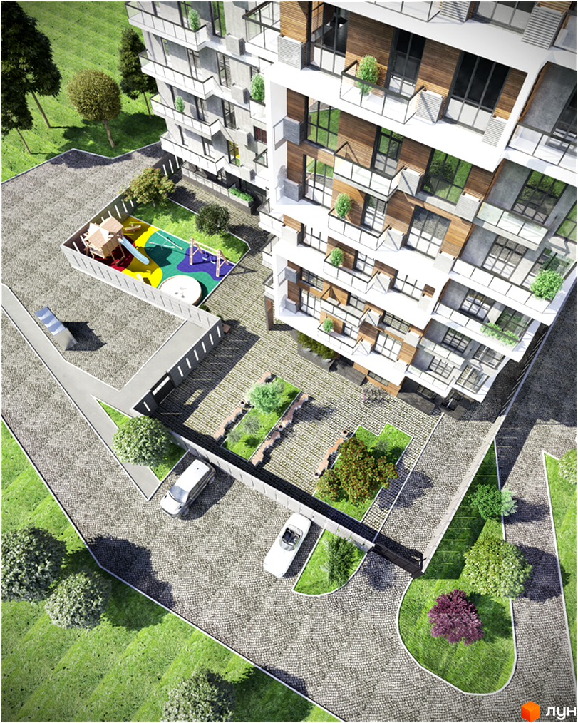Вигляд зверху на житловий будинок Platinum Residence з балконами та панорамними вікнами. На території дитячий майданчик, зелені насадження та парковка.