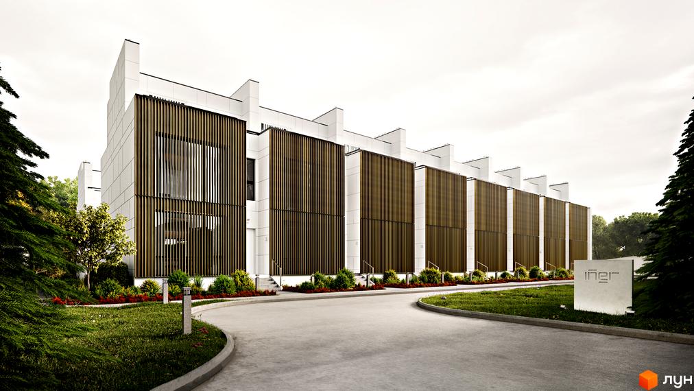 Зовнішній вигляд житлового комплексу Iner Home з білими фасадами та дерев'яними панелями. На передньому плані - доглянута прибудинкова територія з газоном та дорогою.