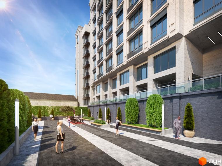 Житловий комплекс CRYSTAL RESIDENCE зі світлим фасадом та великими вікнами. Мощені доріжки, зелені насадження та люди на прибудинковій території.