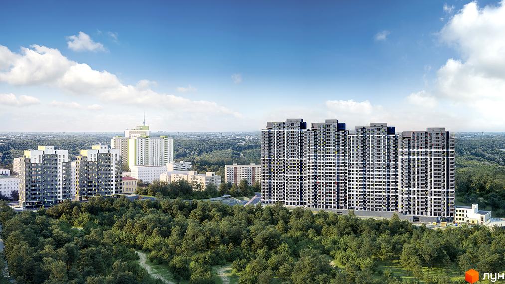 Житловий комплекс Кирилівський Гай: високі багатоповерхові будинки сірого кольору з білими та кольоровими акцентами, оточені густим лісом та зеленою зоною.