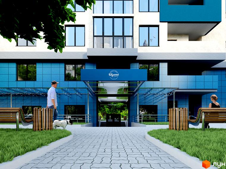 Зображення фасаду та входу в Житловий комплекс Південний квартал. На передньому плані пішохідна зона з бруківки, лавки та зелені насадження.