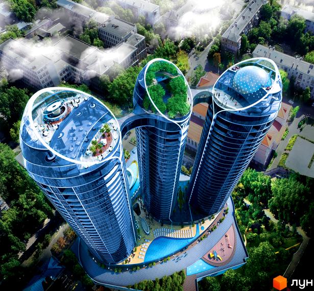 Taryan Towers - три хмарочоси незвичайної форми з зеленими зонами та басейнами на дахах. Навколо комплексу - зелена зона з басейном та дитячим майданчиком.