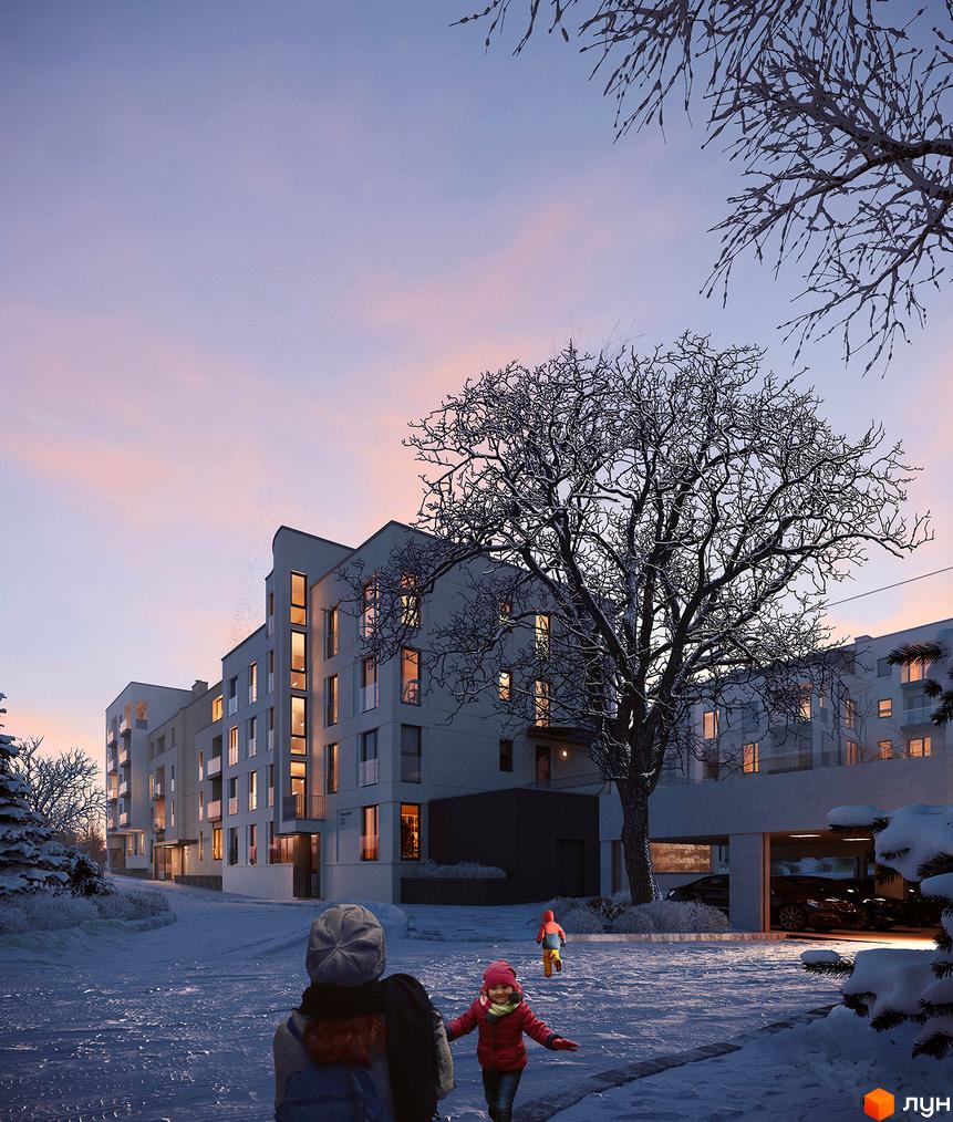 Житловий комплекс Villa Magnolia Spring у зимовий вечір. Сучасна архітектура будівель, засніжена територія та дитячий майданчик.