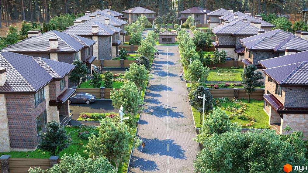 Котеджне містечко Zahrava Village: двоповерхові будинки з цегляними фасадами та темними дахами, розташовані вздовж вулиці з деревами та газонами.