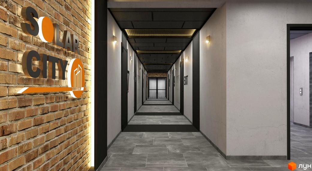 Коридор в ЖК SOLAR CITY з оздобленням з цегли та сірої плитки. На стіні вивіска з назвою житлового комплексу.