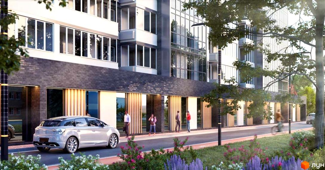 Зображення фасаду та прибудинкової території Житлового комплексу Family Park. На передньому плані квіти та проїжджа частина.