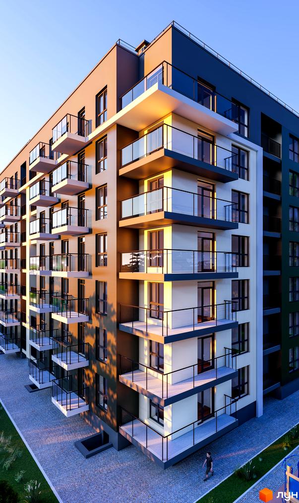 Житловий комплекс Святий Антоній: багатоповерховий будинок зі світлими та темними фасадами, балконами зі склом. Прибудинкова територія викладена бруківкою.