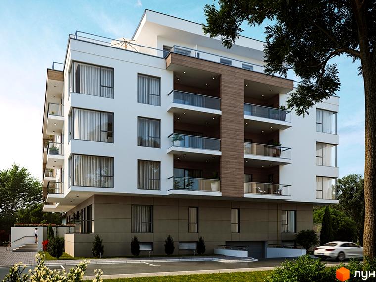 Житловий комплекс Baltiysʹka Hall з білим фасадом, коричневими вставками та скляними балконами. Навколо зелені насадження та проїжджа частина з автомобілем.