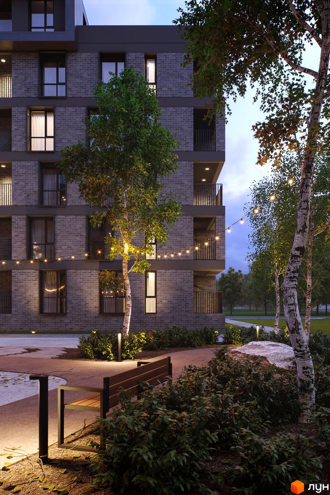 Житловий комплекс Avalon Time. Фасад будинку з цегляним оздобленням, вікнами та балконами. Прибудинкова територія з ландшафтним дизайном, освітленням та місцями для відпочинку.