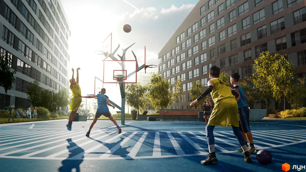 Багатопоповерхові будинки Житлового комплексу Greenville Park Lviv з великими вікнами. На прибудинковій території розташований баскетбольний майданчик з гравцями.