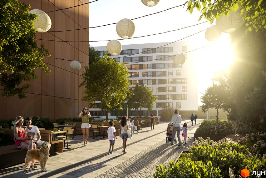 Зображення прибудинкової території Житлового комплексу Greenville Park Lviv. На фото люди відпочивають на лавках біля будинку.