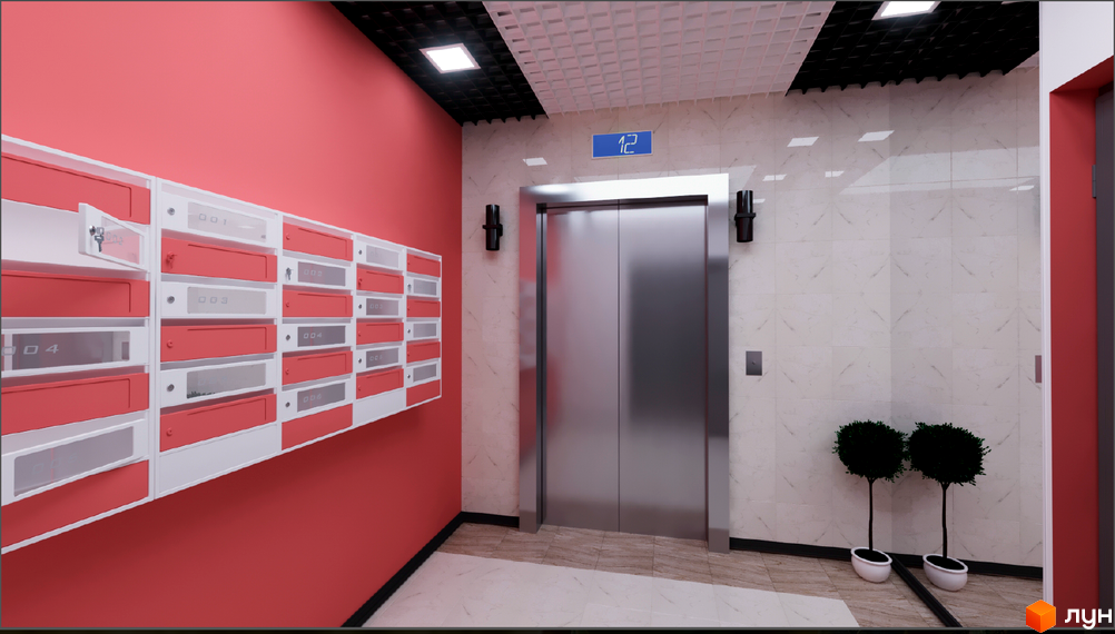 Інтер'єр житлового комплексу Гармонія. Коридор з поштовими скриньками та ліфтом, оздоблений світлими матеріалами.