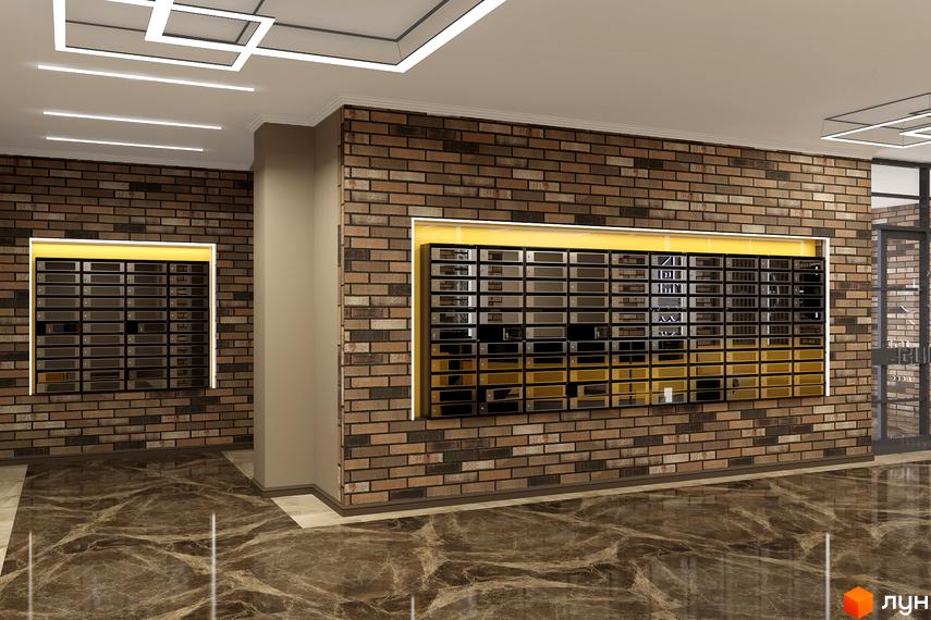 Інтер'єр холу в ЖК LAKE HOUSE з цегляною стіною та поштовими скриньками. На підлозі глянцева плитка, зверху світлодіодне освітлення.