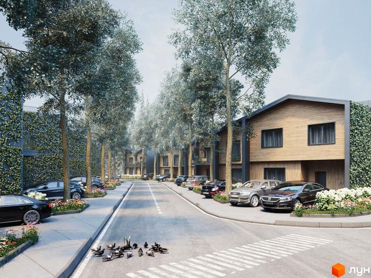 Котеджне містечко Comfort City Lagoon з дерев'яними фасадами та зеленою зоною. Навколо новобудови розташовані дерева та автомобілі.