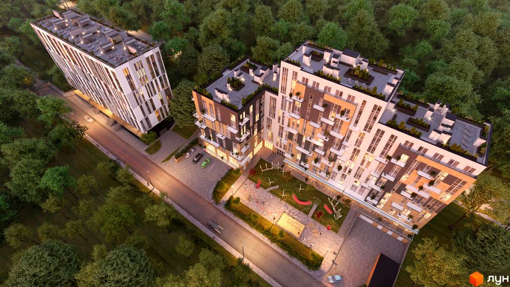 Житловий комплекс OBRIY2 з багатоповерховими будинками та терасами, що оточені деревами. На прибудинковій території розташований дитячий майданчик та парковка.