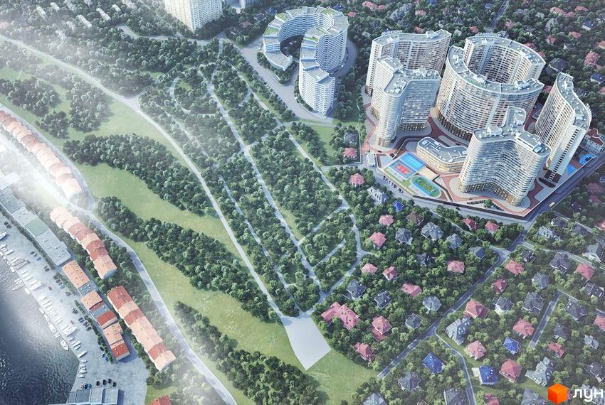 Вид на житловий комплекс Сорок восьма перлина з висоти пташиного польоту, що демонструє багатоповерхові будинки та зелену прибудинкову територію з зонами відпочинку.