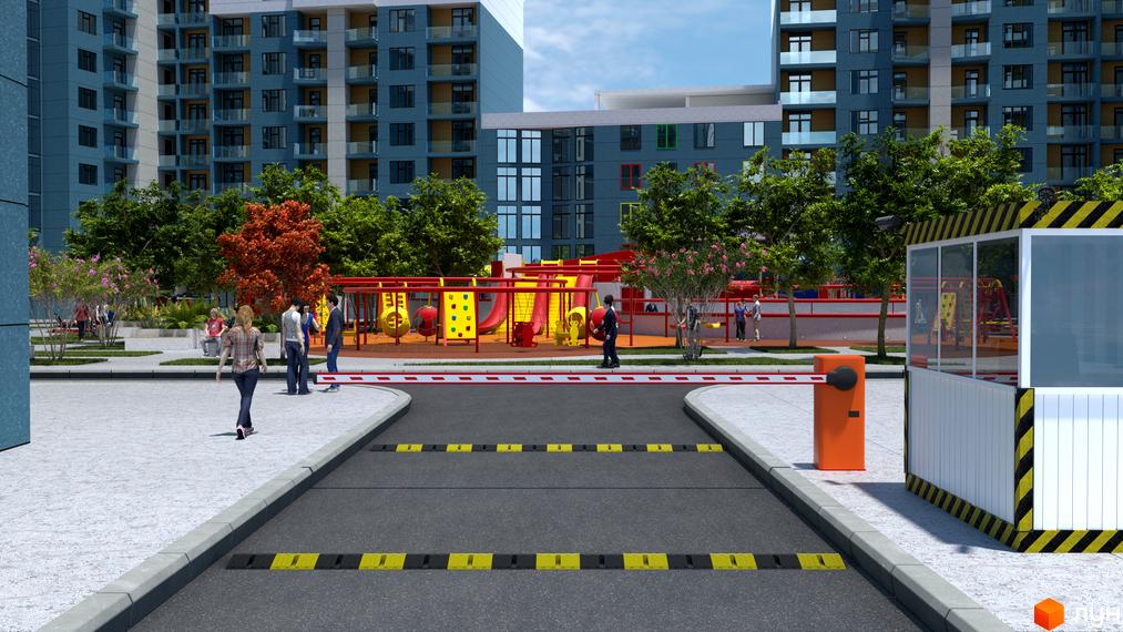 Житловий комплекс Національний. Високі будинки з синіми фасадами. На території комплексу дитячий майданчик та зелені насадження.