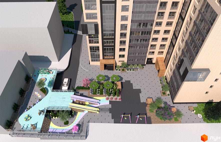 Житловий комплекс Гармонія-2: вид зверху на цегляний будинок та облаштований двір з дитячим майданчиком, гірками та зонами відпочинку.