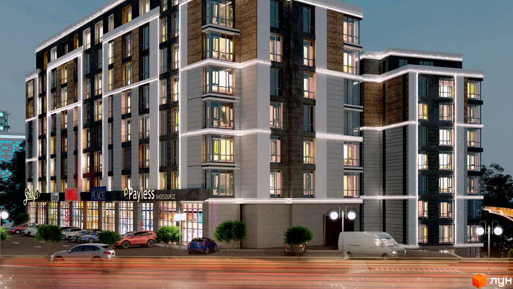 Житловий комплекс Район-2. Сучасна архітектура з підсвіткою, панорамними вікнами та комерційними приміщеннями на першому поверсі. Перед будинком розташована парковка з автомобілями та зелені насадження.