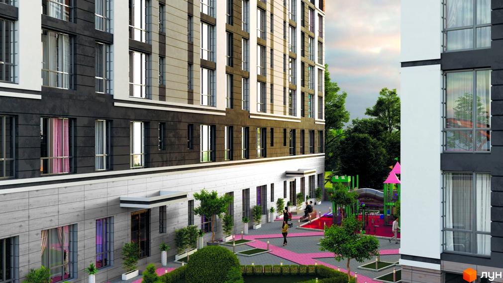 Фасад житлового комплексу Район-2 з великими вікнами та балконами. Поруч дитячий майданчик та зелена зона.