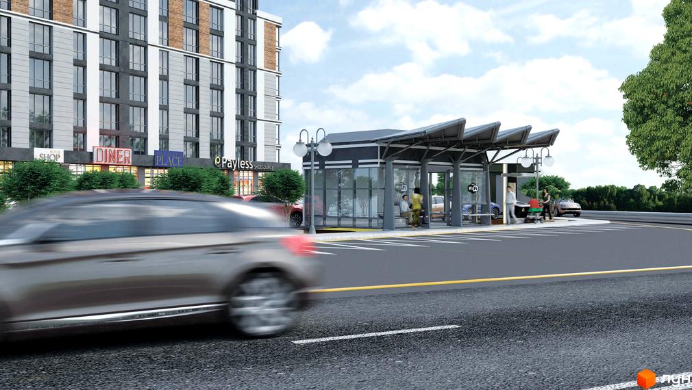 Житловий комплекс Район-2: сучасна багатоповерхова будівля з комерційними приміщеннями на першому поверсі та зупинкою громадського транспорту поруч. Навколо комплексу зелені насадження та дорога з автомобілем.