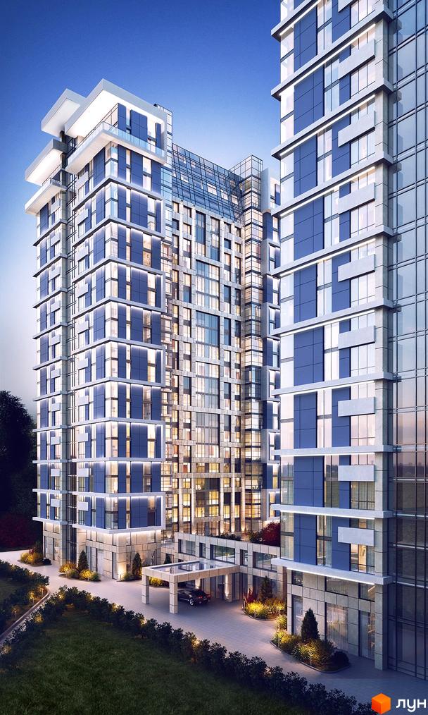 Новобудова Edelweiss House з блакитними та сірими панелями, скляними фасадами та підсвіткою. Прибудинкова територія з доглянутим газоном, освітленням та навісом для автомобілів.