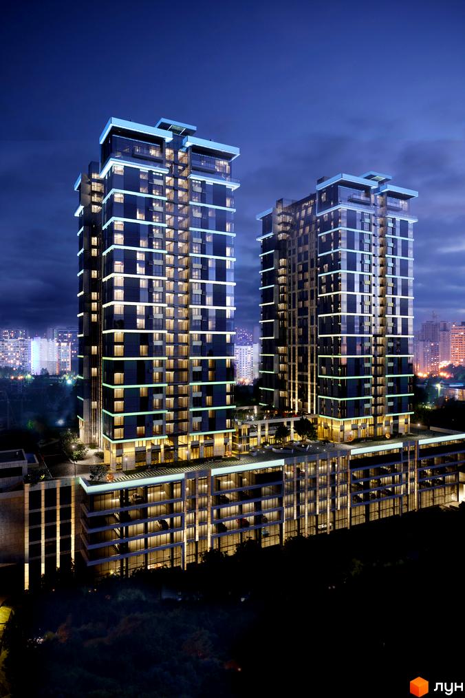 Житловий комплекс Edelweiss House у вечірній час. Сучасна архітектура з підсвічуванням фасадів та вікон. Навколо зелені насадження та міський пейзаж.