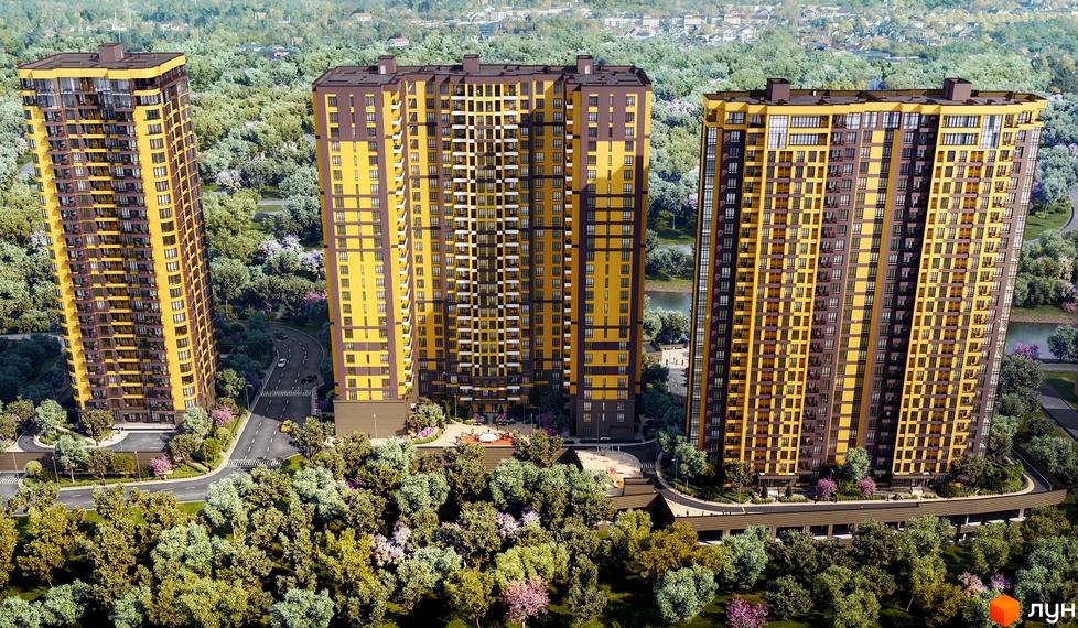 Житловий комплекс Медовий-2: три висотні жовто-коричневі будинки оточені зеленню та деревами, з дорогою та автомобілями.