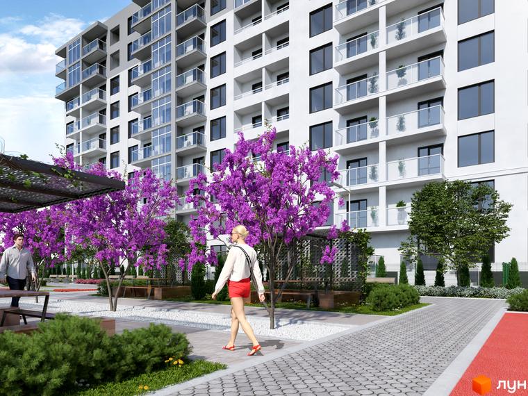 Зображення фасаду багатоповерхового будинку в Житловому комплексі KromaxBud. На передньому плані пішохідна зона з деревами та лавками.