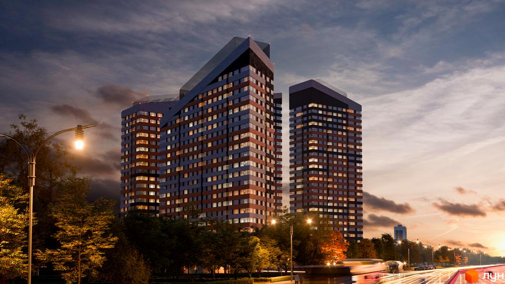 Зображення житлового комплексу Terracotta. Багатоповерхові будинки з великою кількістю вікон та освітленням, навколо дерева та дорога.