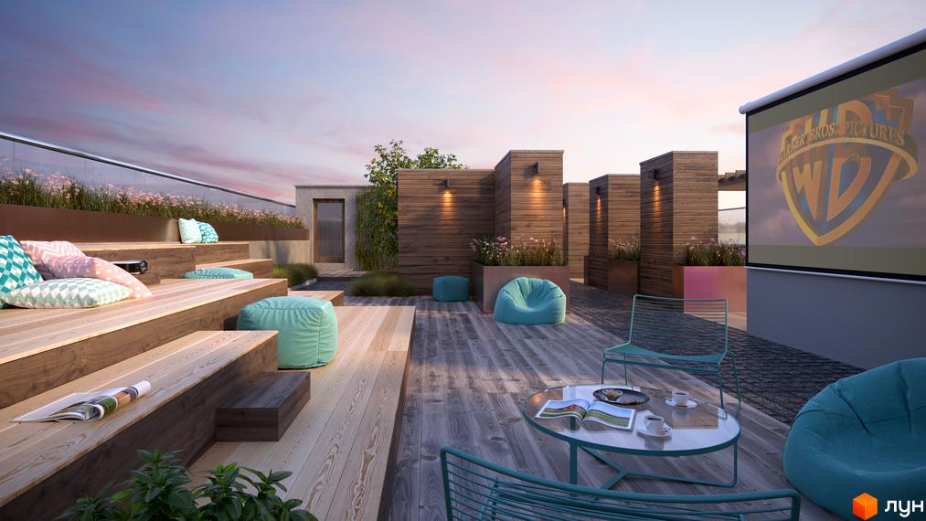 Відкритий кінотеатр на даху ЖК Lazur Sky з дерев'яними терасами та зручними пуфами. Сучасний простір для відпочинку та перегляду фільмів під відкритим небом.