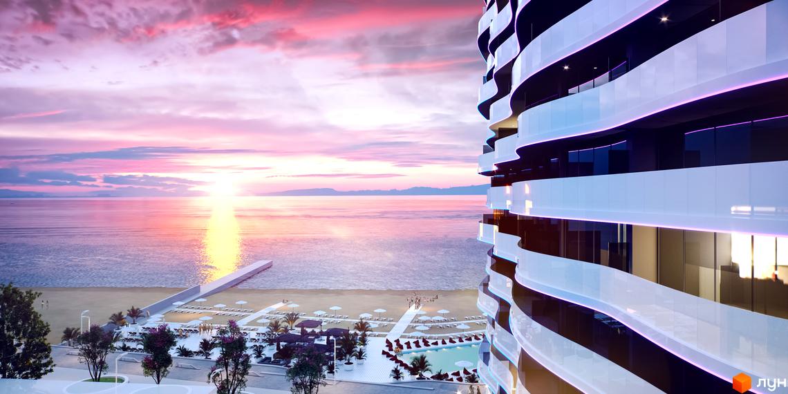 Aura Apart - житловий комплекс з хвилястою архітектурою та підсвіткою, що виходить до моря. На території комплексу розташований пляж з шезлонгами та басейн.