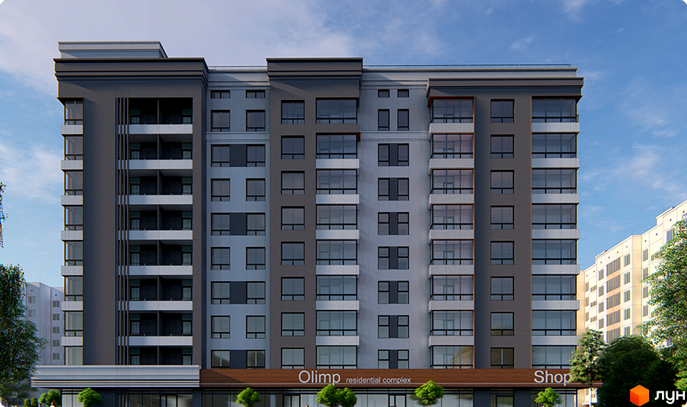 Фасад житлового комплексу Olimp residential complex. Будинок має багато вікон та балконів, виконаний у сірих та світло-сірих тонах. На першому поверсі розташовані комерційні приміщення з вивісками