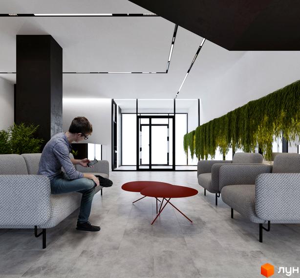 Сучасний інтер'єр холу житлового комплексу Silver Flow з диванами, журнальним столиком та зеленню.