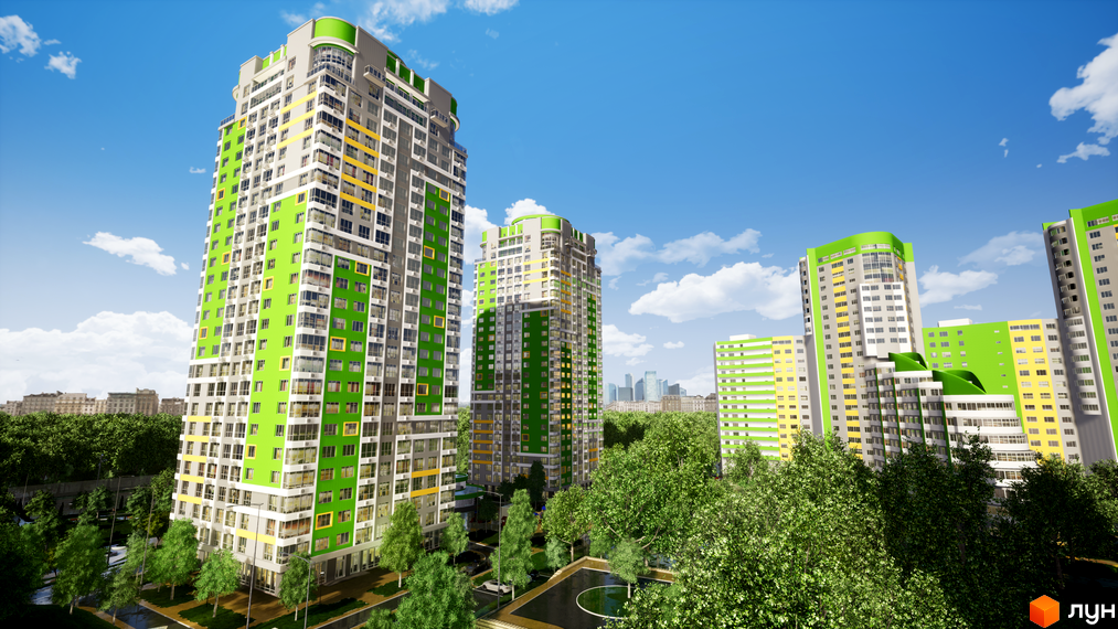 Високі житлові будинки Житлового комплексу Паркове місто з фасадами зеленого, сірого та жовтого кольорів. Навколо багато дерев та зелених насаджень.