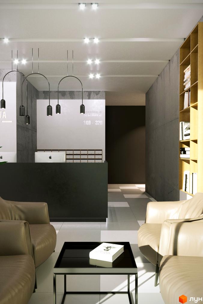 Сучасний інтер'єр лобі житлового комплексу Прохоровський квартал з диванами, журнальним столиком та рецепцією.