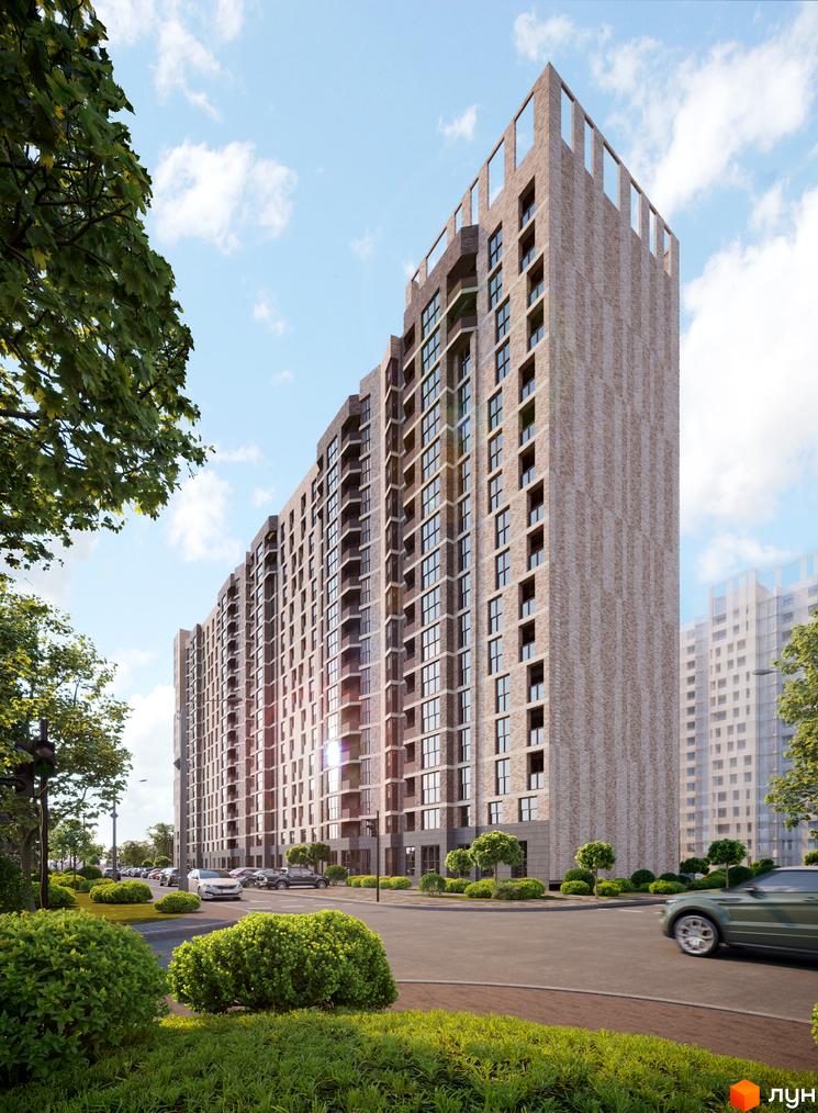 Зовнішній вигляд новобудови Прохоровський квартал з цегляним фасадом та численними вікнами, навколо зелені насадження та дорога з автомобілями.