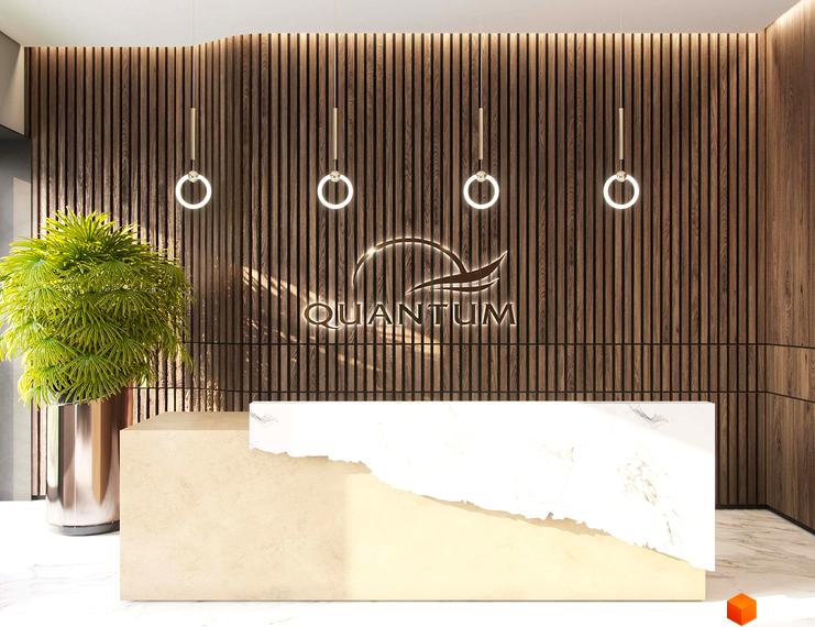 Рецепція Житлового комплексу Baltiysʹka Hall з дерев'яною стіною, підсвіченим логотипом та мармуровою стійкою. Інтер'єр містить велику зелену рослину.