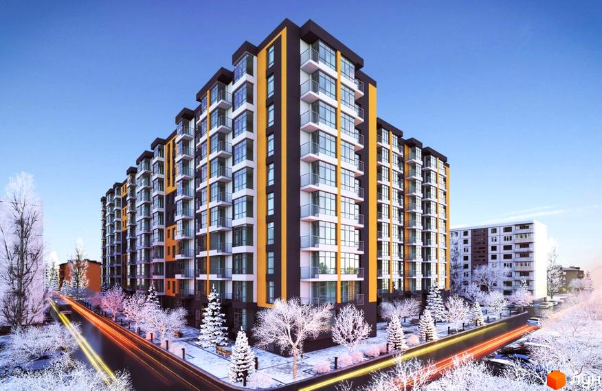 Зображення фасаду багатоповерхового будинку в Житловому комплексі Comfort City. Навколо будівлі засніжена прибудинкова територія з деревами.