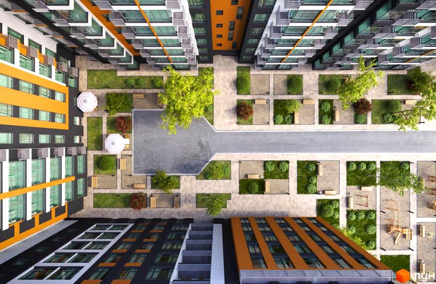 Житловий комплекс Comfort City. Вид зверху на будівлі з помаранчевими та чорними фасадами. На прибудинковій території розташовані газони, дерева, лавки та дитячий майданчик.