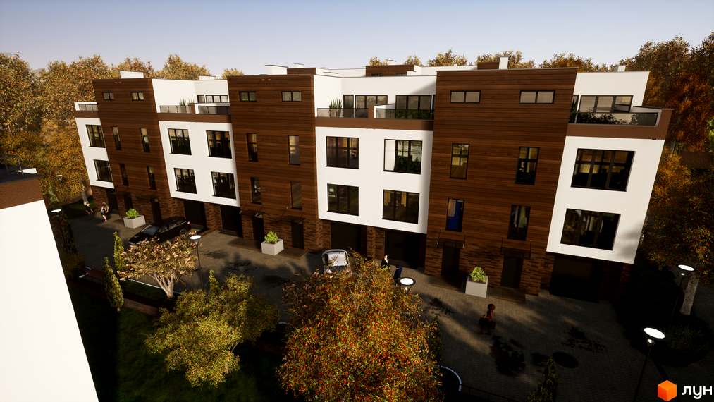 Таунхауси Sunny Village з коричневими та білими фасадами. Прибудинкова територія з бруківкою, авто та зеленими насадженнями.