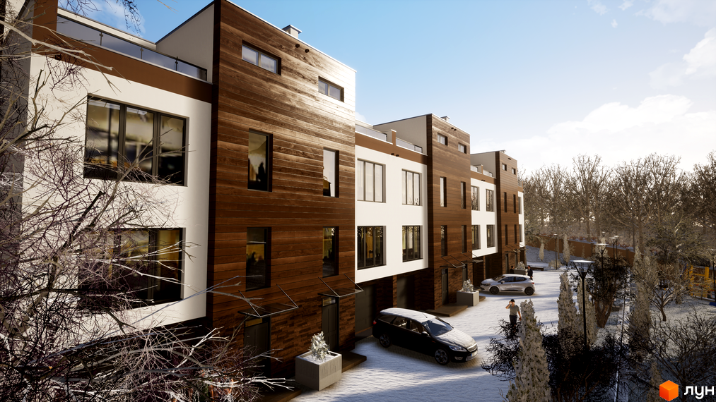 Таунхауси Sunny Village з дерев'яним оздобленням та великими вікнами взимку. Прибудинкова територія з доріжками, деревами та автомобілями.